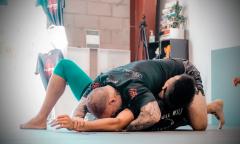 Two students learning no-gi Jiu Jitsu skills