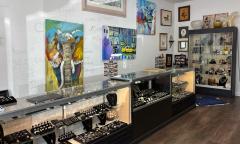 Glass displays and wall art hanging at the shop