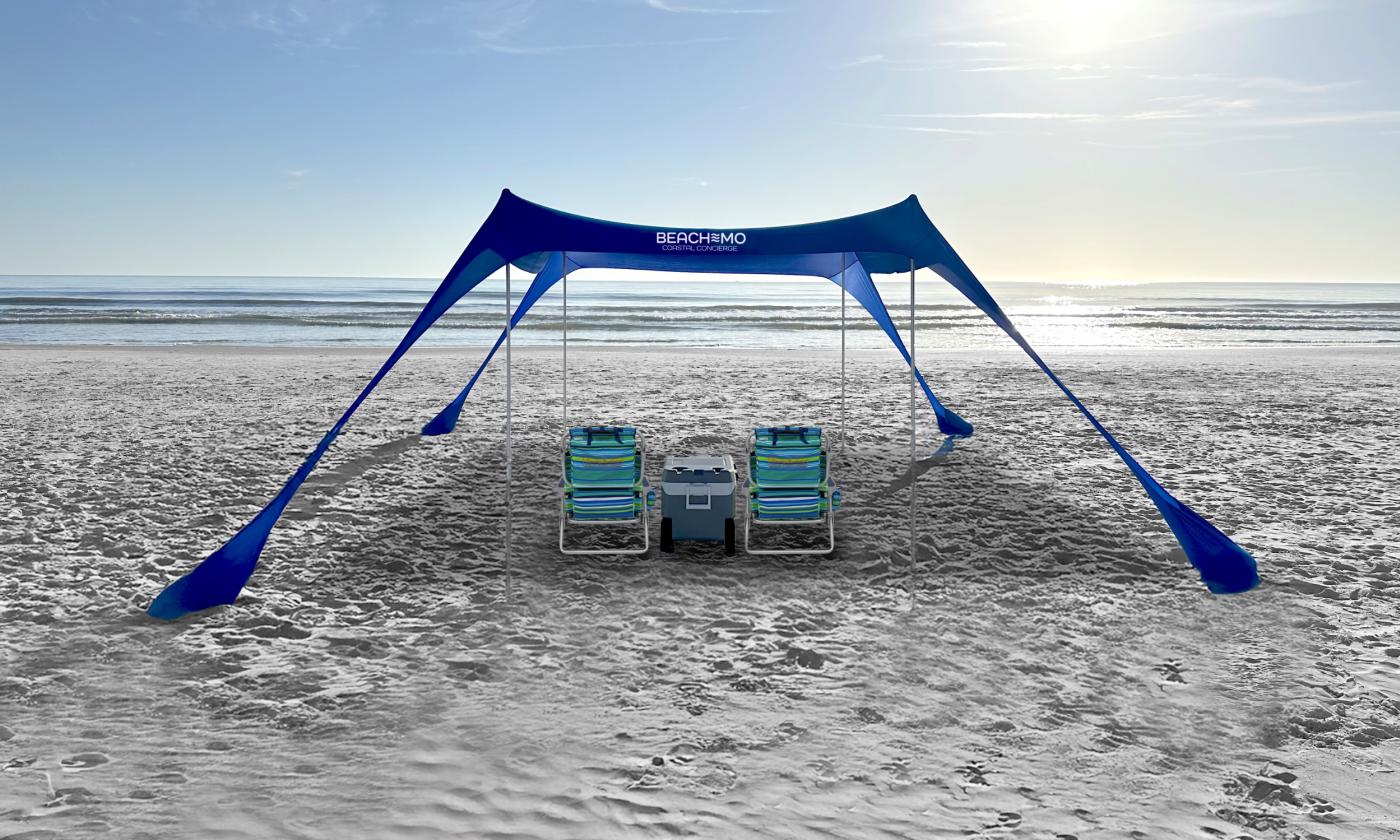 A cabana with chairs and a cooler underneath