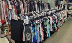 Racks of clothing at Catholic Charities Thrift Store
