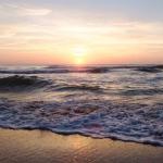 Sun on the horizon at Crescent Beach in St. Augustine, Florida