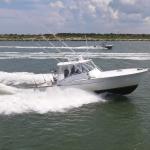 A boat from Drop Down Sport Fish Charters out on the water