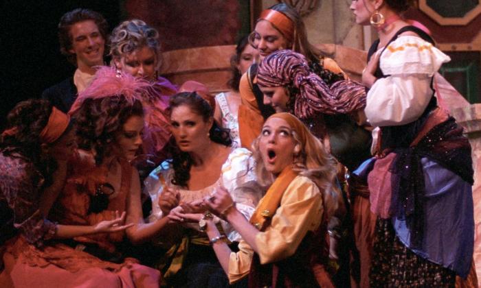 Women on stage performing an opera