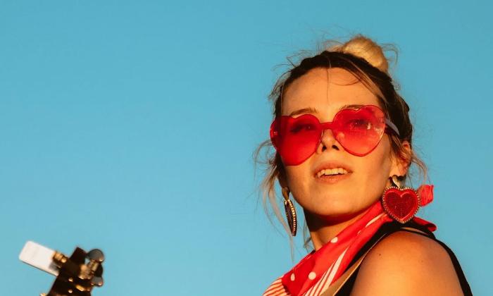 Singer-songwriter Jaimee Harris in pink sunglasses