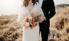 A bride holding a bouquet of flowers